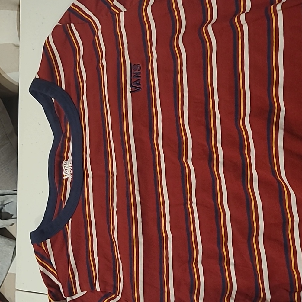 A red stripped kids shirt